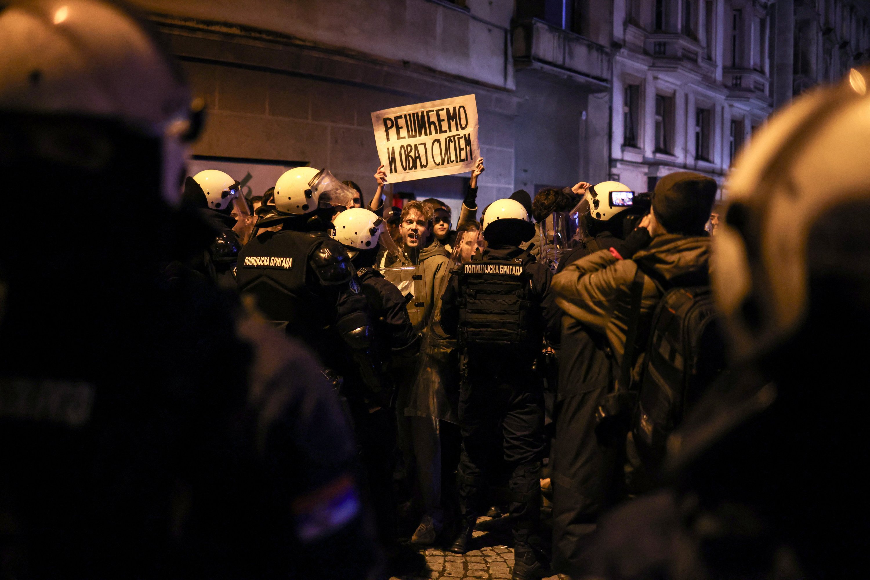 359263 Students of Belgrade University protest as Serbian President Aleksandar Vucic holds a news conference in front of his office in Belgrade, Serbia, Dec. 11, 2024. (Reuters Photo)