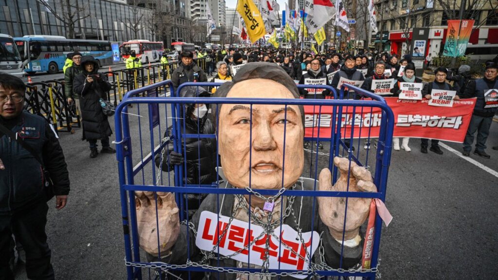 Demonstrators from a labor group take part in a protest calling for the ouster of South Korean President Yoon Suk Yeol outside city hall, Seoul, South Korea, Dec. 12, 2024. (AFP Photo)
