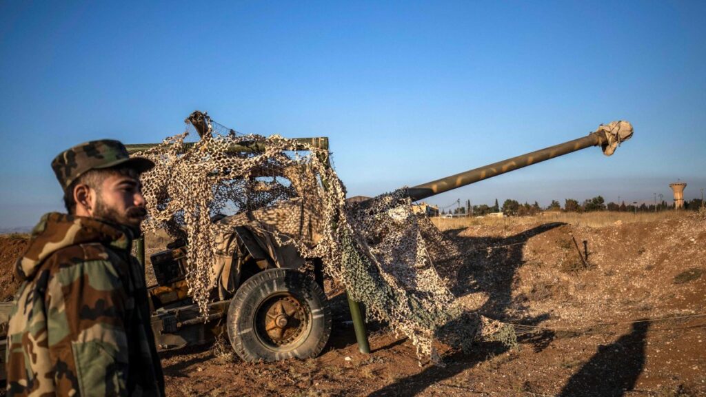 Terrorist YPG/PKK-led SDF fighter inspects damaged and abandoned military vehicles and equipment at the Qamishli International Airport, formerly a joint Syrian-Russian military base, in northeastern Syria's city of Qamishli on Dec. 9, 2024. (AFP Photo)