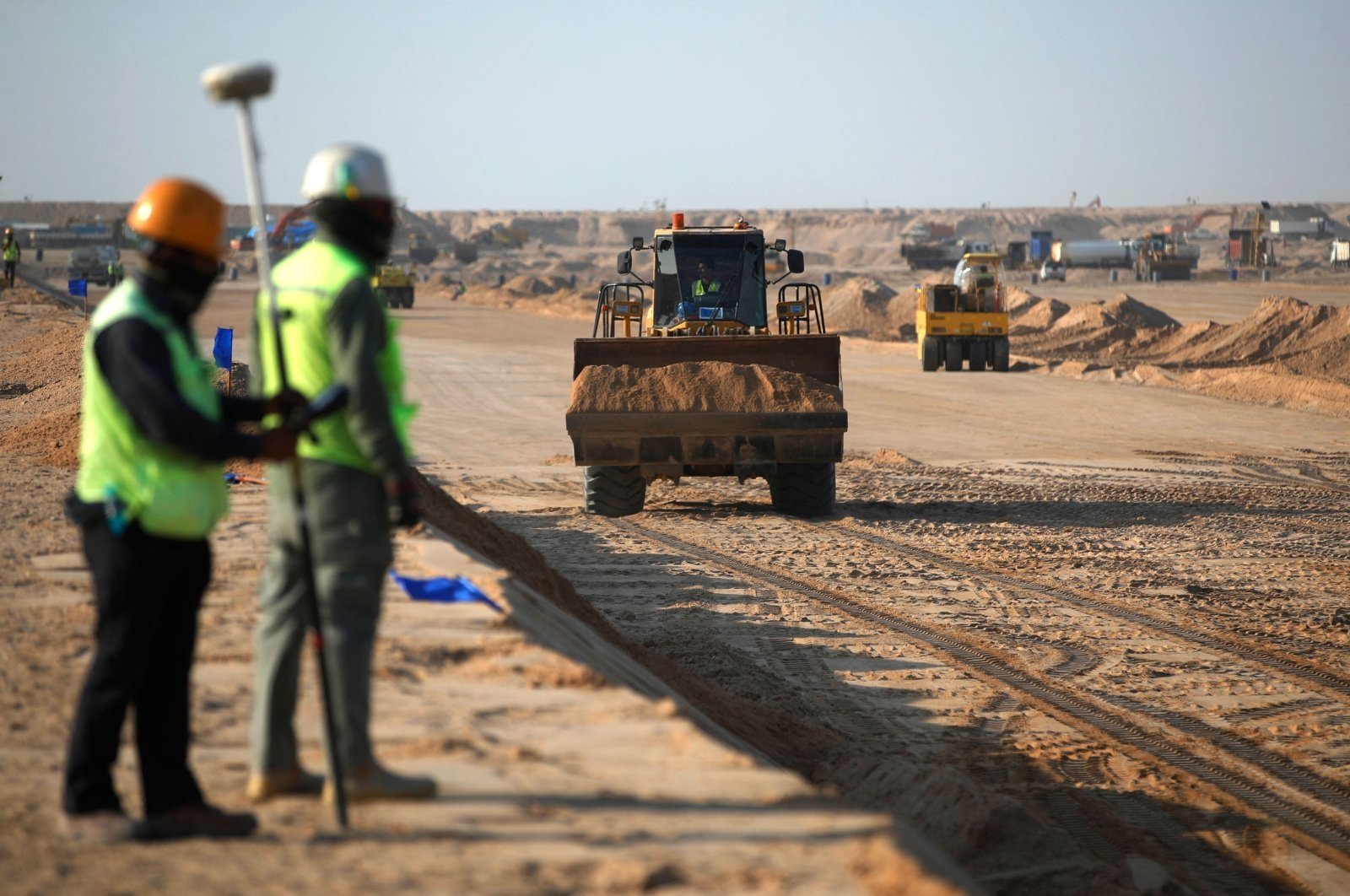 361018 Port workers from Korea's Daewoo Corporation work in the construction site of the Grand Faw Port docks, Basra, southern Iraq, Nov. 6, 2024. (AFP Photo)