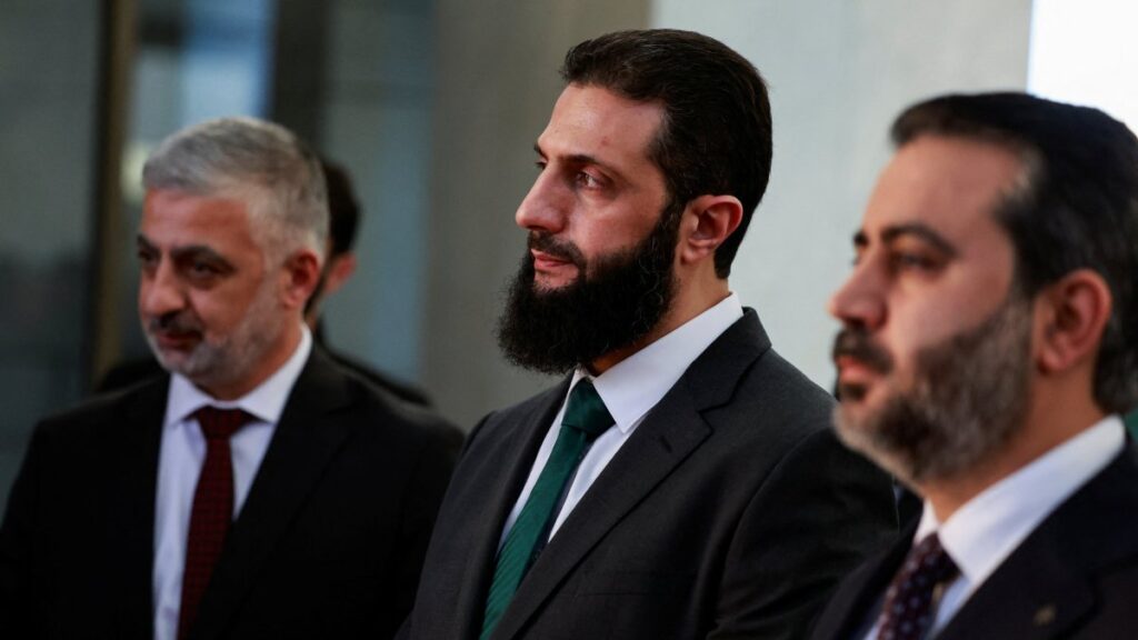 Syria's de facto leader Ahmed al-Sharaa (C) attends a program in Damascus, Syria, Dec. 23, 2024. (Reuters Photo)