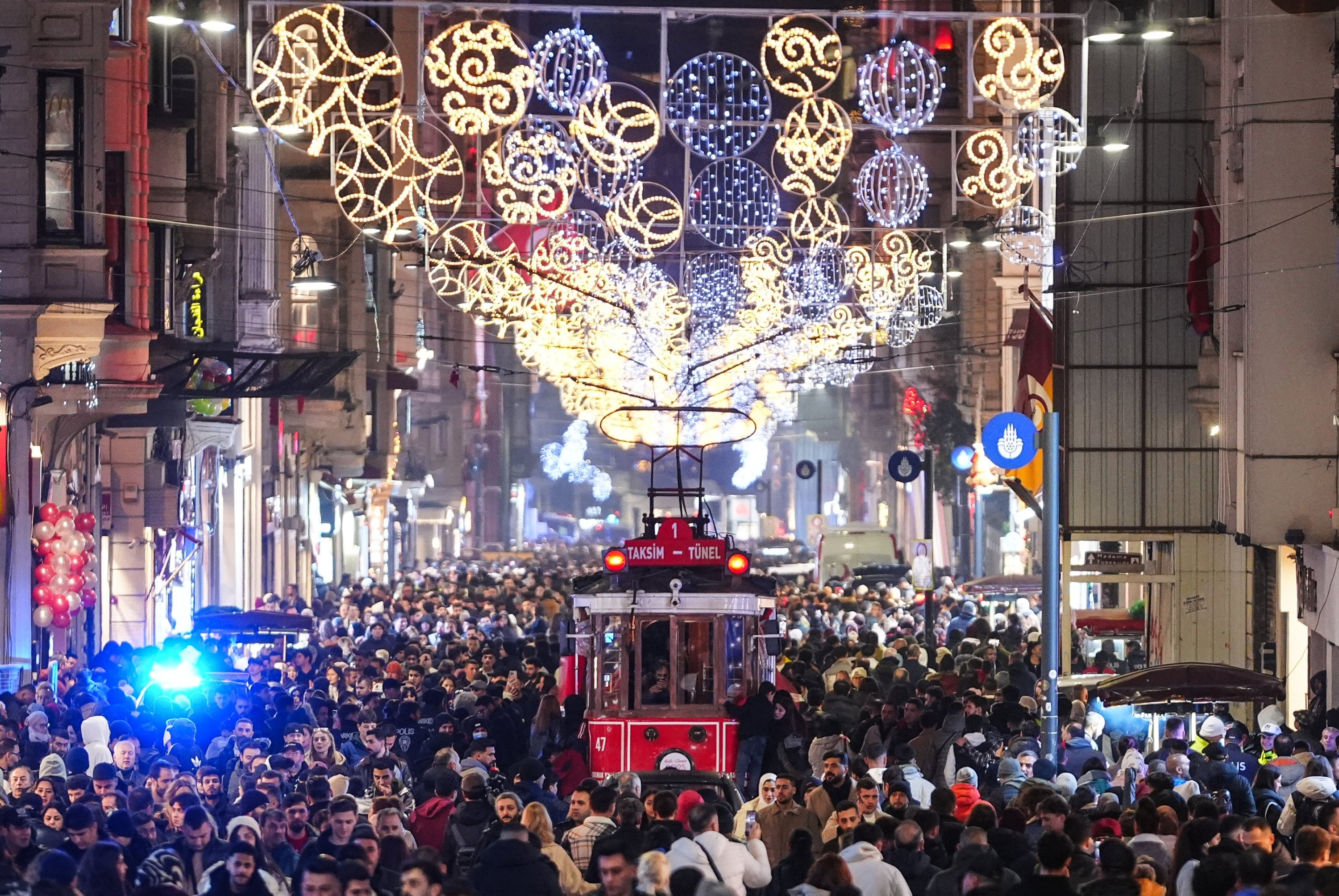 361961 Istiklal Street, one of the most popular locations in the city, hosted crowds gathered to mark New Year, Istanbul, Türkiye, Dec. 31, 2024. (AA Photo)