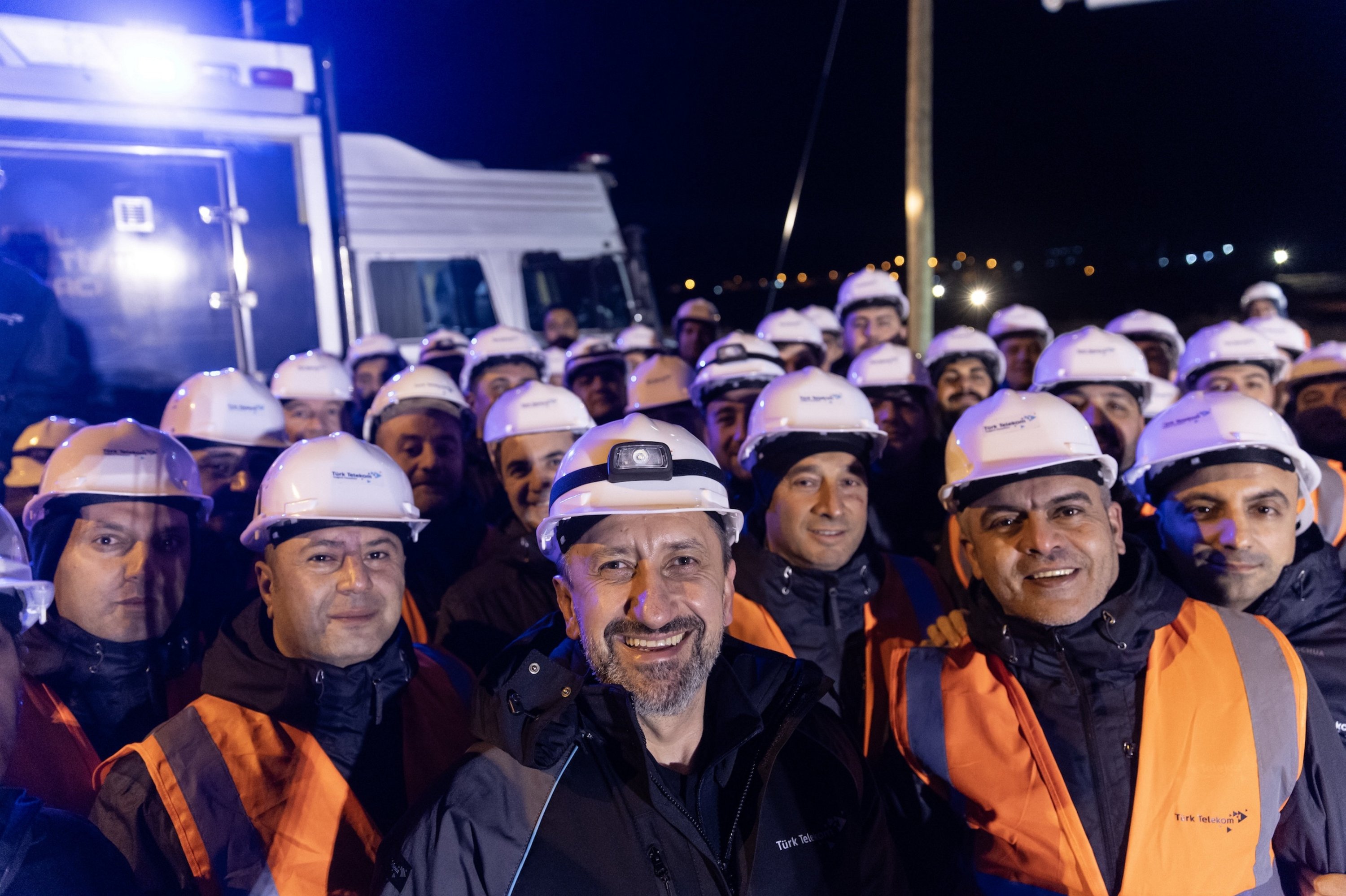 362203 CEO Ümit Önal poses for a photo with Türk Telekom employees in Mardin, southeastern Türkiye, Dec. 31, 2024. (Courtesy of Türk Telekom)
