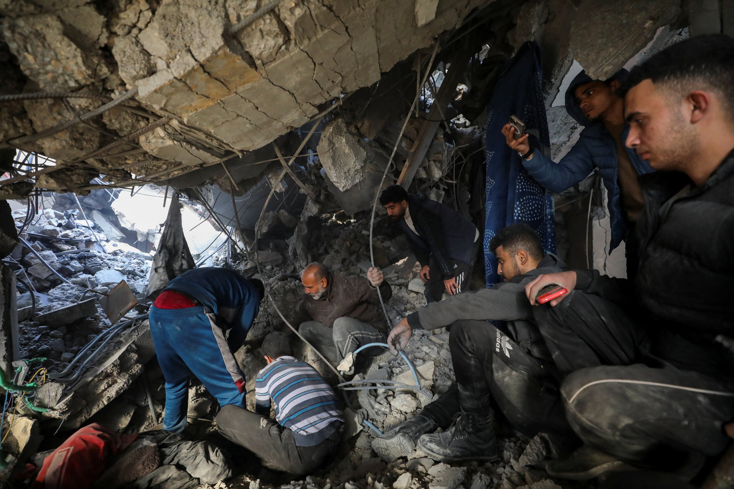 362550 Palestinians search for casualties at the site of an Israeli strike on a house, in Gaza City, Gaza, Palestine, Jan. 5, 2025. (Reuters Photo)