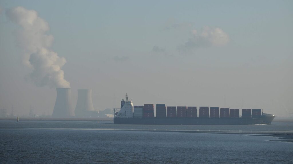 A container ship sails as the nuclear plant of Doel, located in Belgium, is seen in the background, near Kruiningen, Netherlands, Jan. 10, 2025. (AFP Photo)
