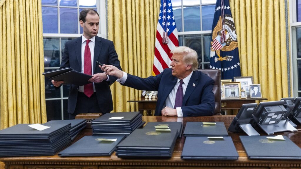 U.S. President Donald Trump signs numerous executive orders, on the first day of his presidency in the Oval Office of the White House in Washington, D.C., U.S., Jan. 20, 2025. (EPA Photo)