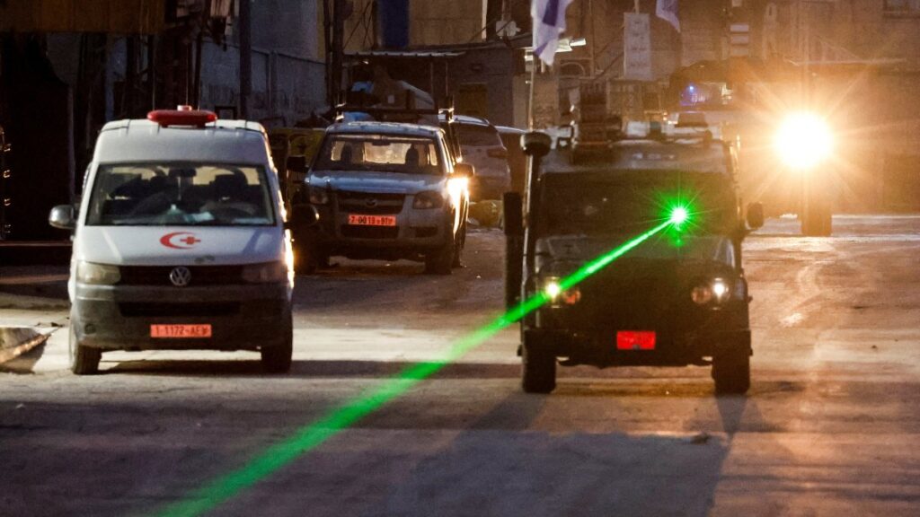 An Israeli military vehicle uses a laser during a raid in Jenin, in the Israeli-occupied West Bank, Palestine, Jan. 21, 2025. (Reuters Photo)