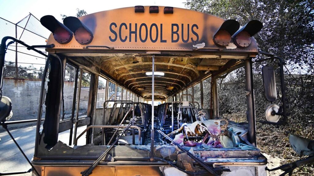A burnt out school bus is seen at the fire-damaged Aveson Charter School from the aftermath of the Eaton Fire in Altadena, California, U.S., Jan. 13, 2025. (AFP Photo)