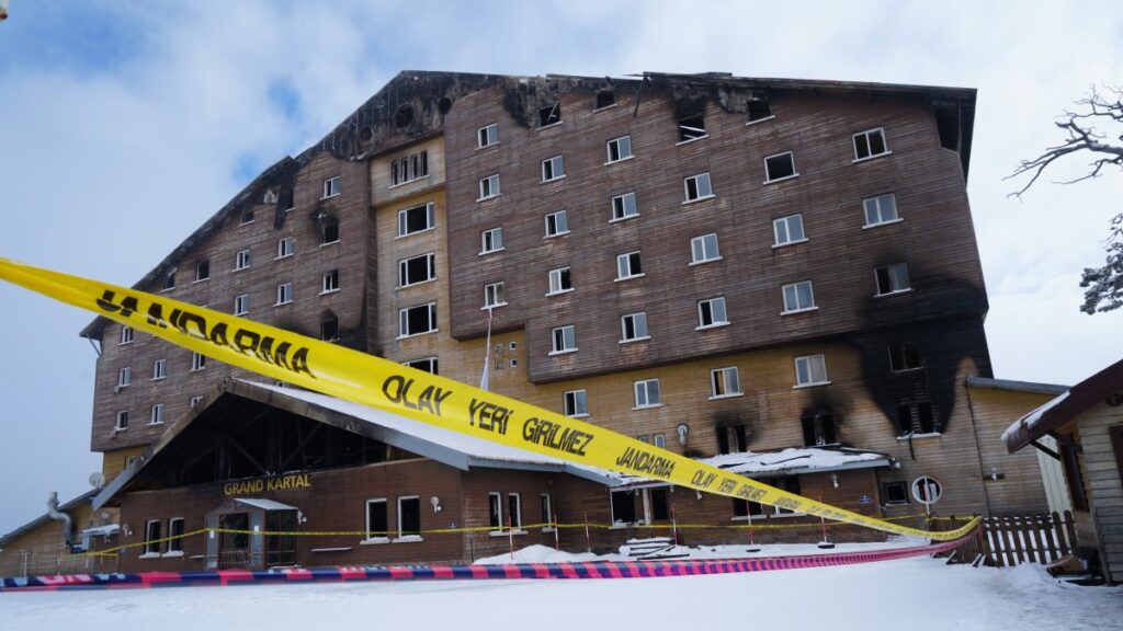 The burnt remains of the Grand Kartal Hotel in Kartalkaya after a devastating fire that led to the death of 76 people, Bolu, Türkiye, Jan. 24, 2025. (IHA Photo)