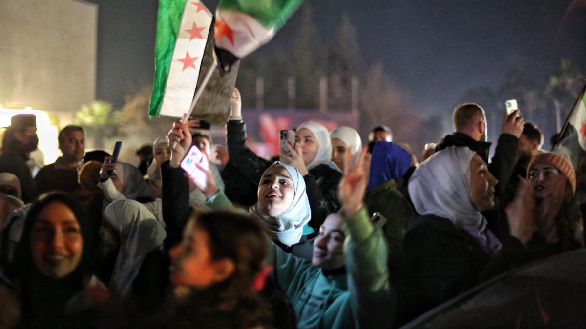 People celebrate in the streets after Syrian leader Ahmed al-Sharaa was named president to oversee a transitional period in Damascus, Syria, Jan. 29, 2025. (EPA Photo)