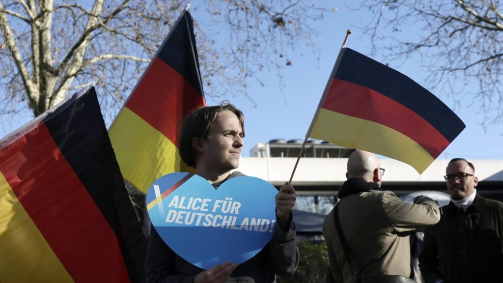 A supporter of the Alternative for Germany (AfD) party holds a heart-shaped sign reading "Alice for Germany" during the election campaign of the AfD, Neu-Isenburg, Germany, Feb. 1, 2025. (EPA Photo)