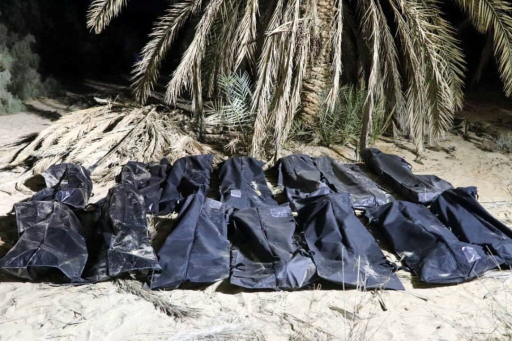 Bodies of migrants lie in bags after they were discovered in a mass grave on a farm in Jikharra, Libya, Feb. 5, 2025. (Reuters Photo)