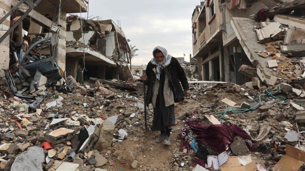 A Palestinian man walks past the debris of buildings in Gaza City's southern al Zeitoun neighborhood, Gaza, Palestine, Feb. 10, 2025. (AFP Photo)