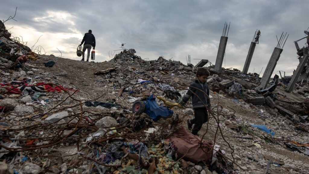 A Palestinian child walks past destroyed houses in the Jabalia camp, north of Gaza City, Palestine, Feb. 11, 2025. (EPA Photo)