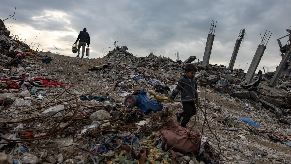 A Palestinian child walks past destroyed houses in the Jabalia camp, north of Gaza City, Palestine, Feb. 11, 2025. (EPA Photo)