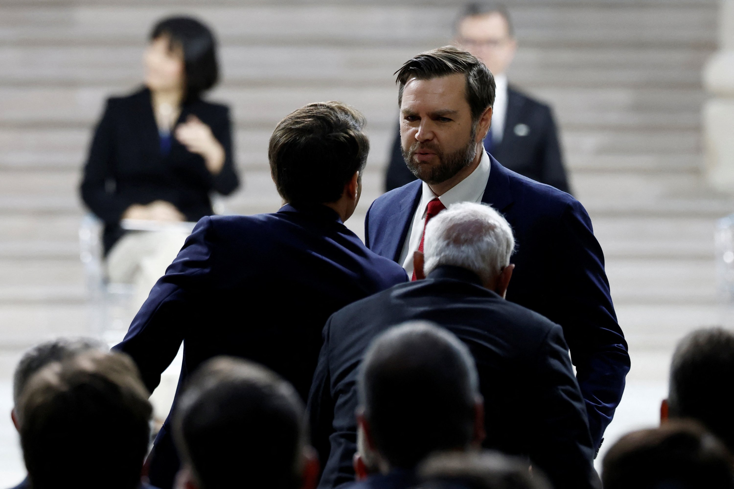 368514 U.S. Vice President JD Vance greets French President Emmanuel Macron and Indian Prime Minister Narendra Modi after delivering a speech during the plenary session of the Artificial Intelligence Action Summit, Paris, France, Feb. 11, 2025. (Reuters Photo)