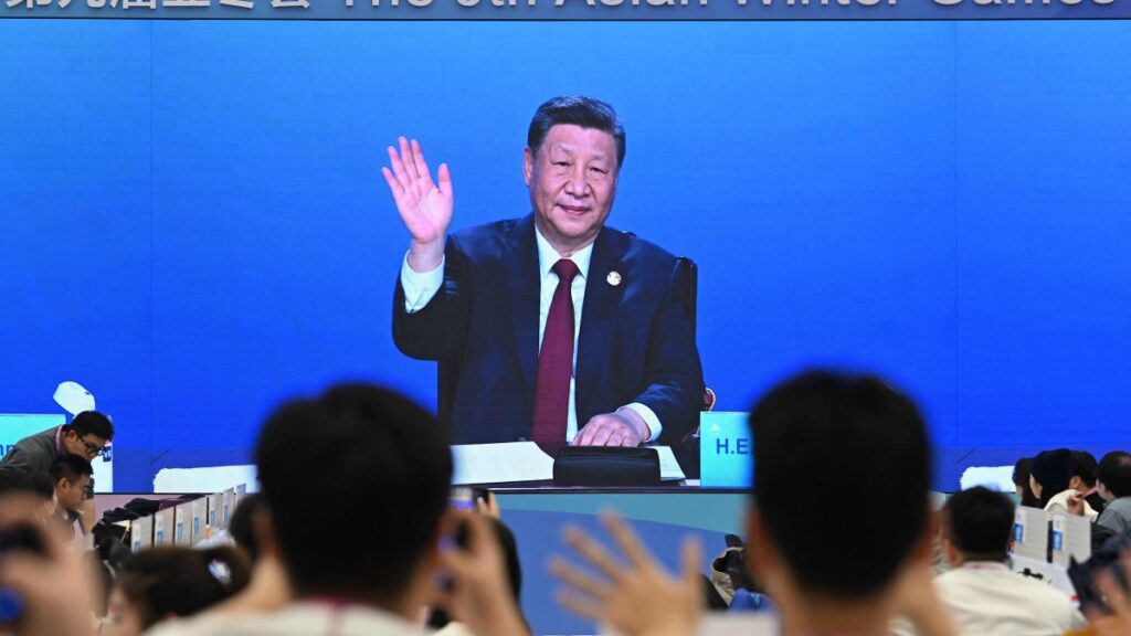 A screen at a media center shows China's President Xi Jinping attending the opening ceremony of the Harbin 2025 Asian Winter Games, Harbin, Heilongjiang province, China, Jan. 7, 2025. (AFP Photo)