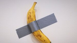 Italian visual artist Maurizio Cattelan's duct-taped Banana entitled "Comedian" is on display during a media preview at Sotheby's in New York, U.S., Nov. 8, 2024. (AFP Photo)