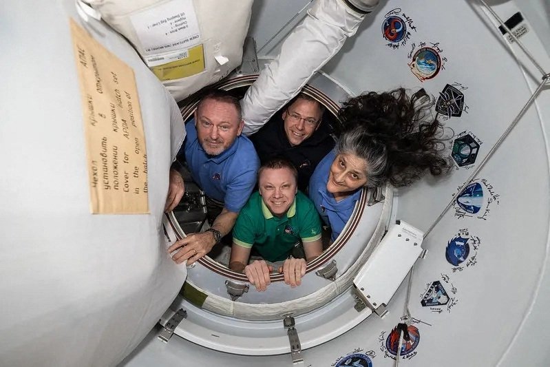 This photo provided by NASA shows the four crew members of NASA’s SpaceX Crew-9 mission, including NASA astronauts Nick Hague, Suni Williams, and Butch Wilmore, along with Roscosmos cosmonaut Aleksandr Gorbunov, posing for a photo aboard the International Space Station, Feb. 26, 2025. (NASA Handout via AFP)
