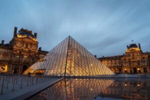 The Louvre Pyramid at sunset, Paris, France. (Shutterstock Photo)