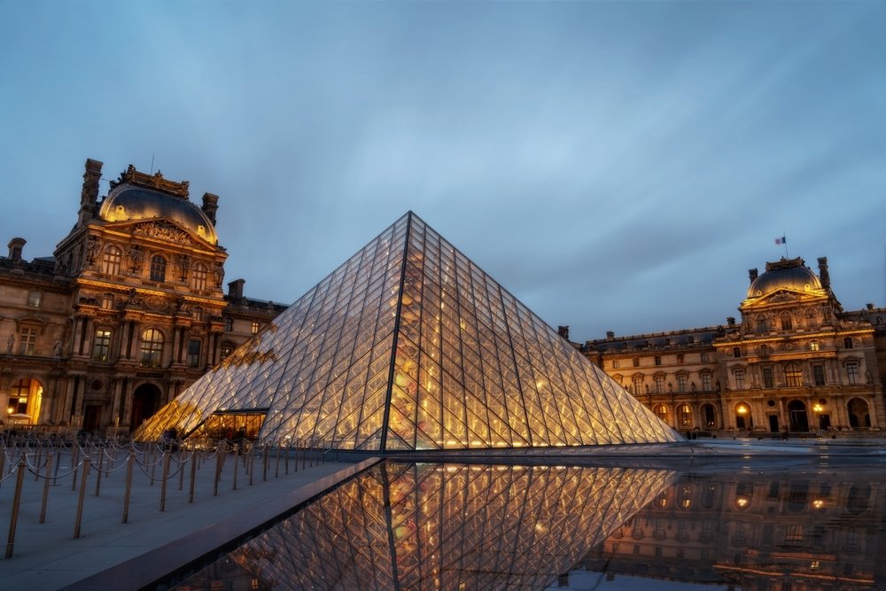 The Louvre Pyramid at sunset, Paris, France. (Shutterstock Photo)