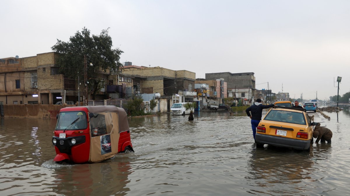 An autorickshaw drives through a flooded street, after heavy rainfall in Baghdad, Iraq, March 8, 2025. (Reuters Photo)