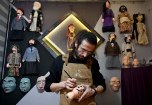 The puppeteer and theater artist Oğuzhan Vartolioğlu produces Ibiş puppets using a 3D printer, Erzurum, Türkiye, March 18, 2025. (IHA Photo)
