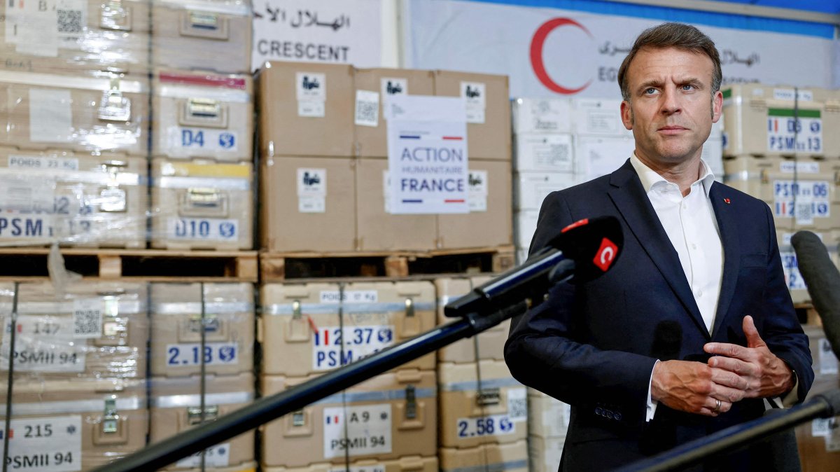 French President Emmanuel Macron talks to media during a visit to Egyptian Red Crescent warehouses storing aid for Gaza, in the Egyptian border town of el-Arish, Egypt, April 8, 2025. (AFP Photo)