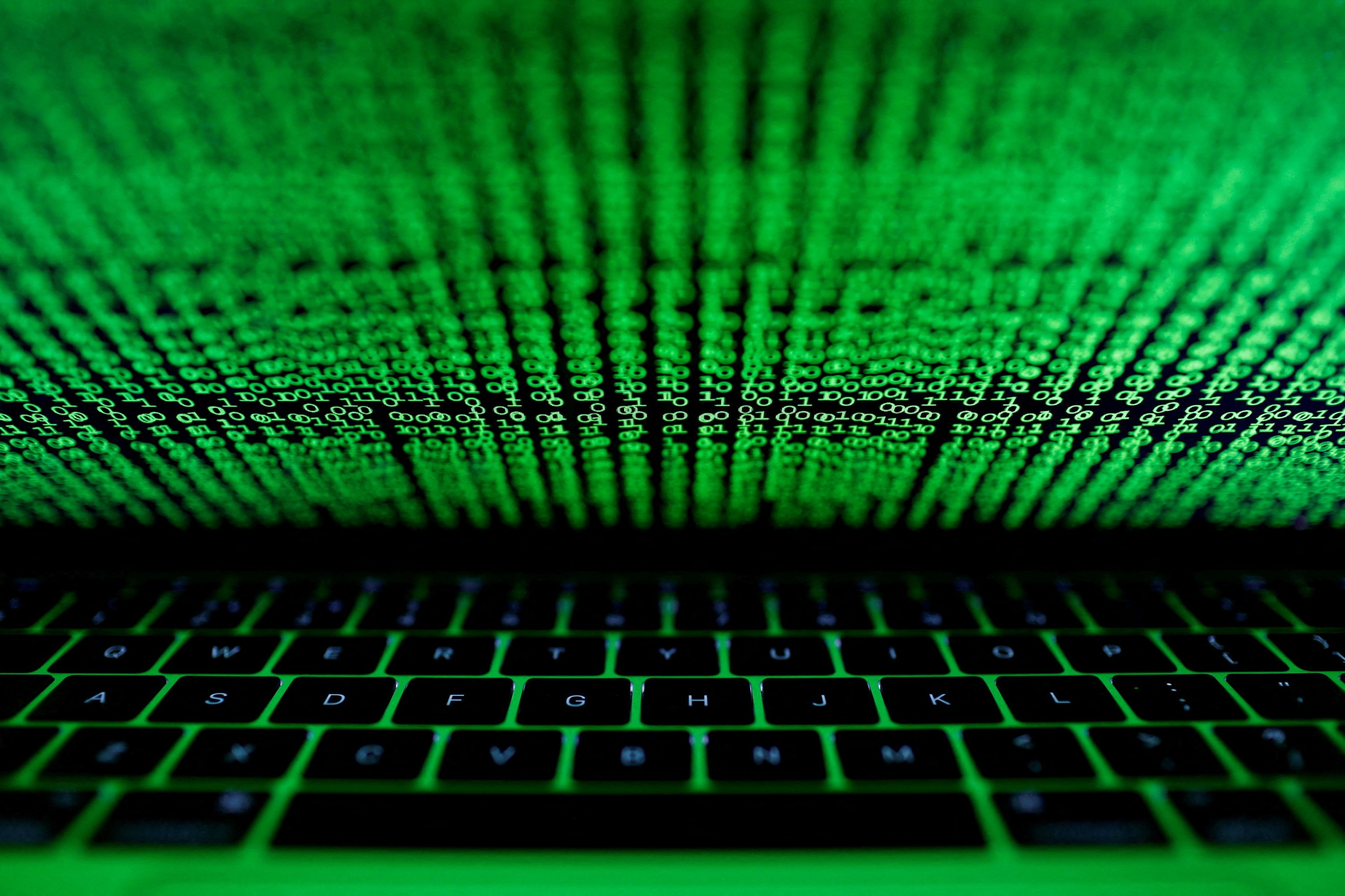 377063 A computer keyboard lit by a displayed cyber code is seen in this illustration picture taken on March 1, 2017. (Reuters Photo)
