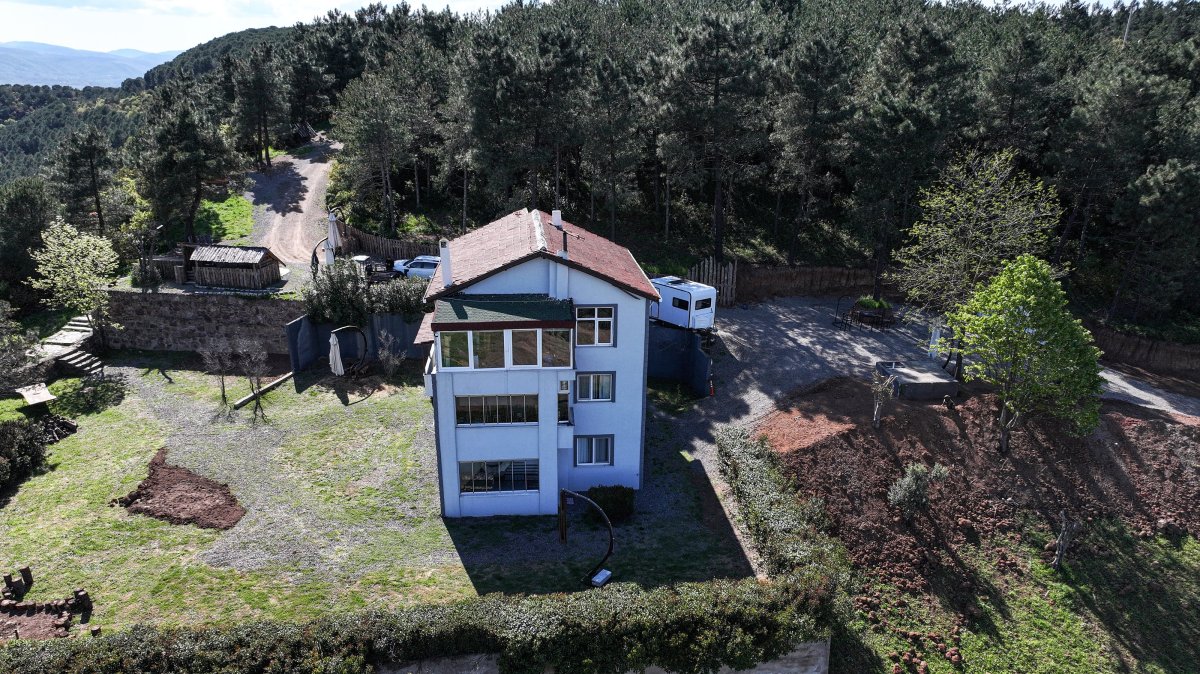 Drone footage shows the house perched on the peak of the mountain, Yalova, Türkiye, April 11, 2025. (AA Photo)
