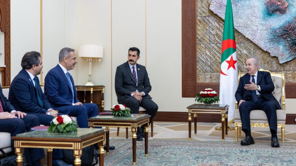 Foreign Minister Hakan Fidan (2nd L) is received by Algerian President Abdelmadjid Tebboune (R) at the Presidential Palace, Algiers, Algeria, April 21, 2025. (AA Photo)