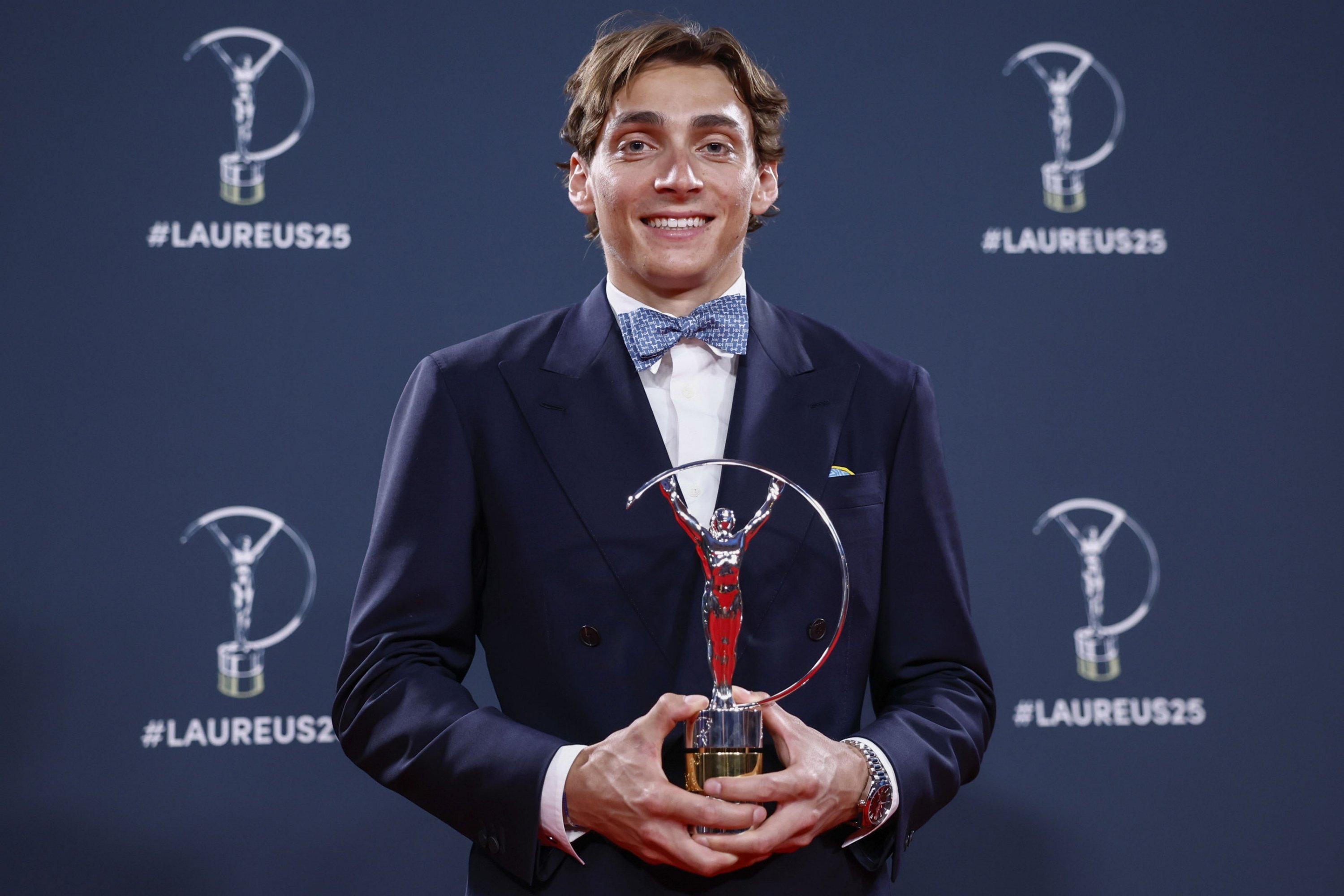 378823 Sweden's athlete Armand 'Mondo' Duplantis poses with the World Sportsman of the Year award during the 2025 Laureus World Sports Awards ceremony, at the Cibeles Palace, Madrid, Spain, April 21, 2025. (EPA Photo)