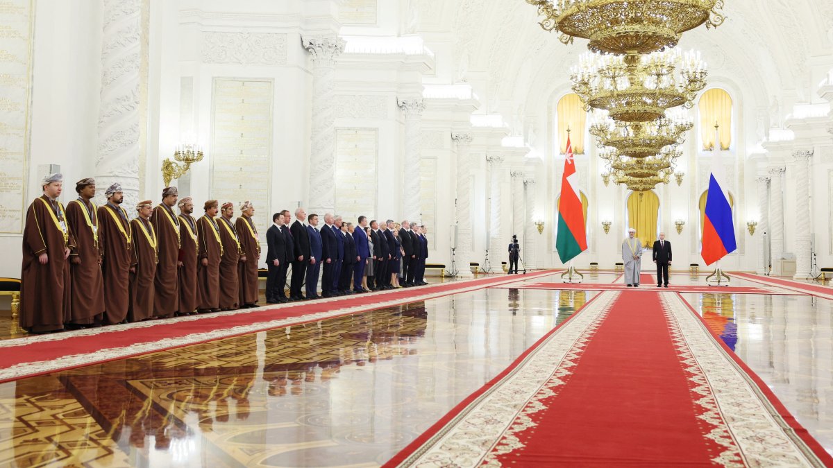 Members of the delegations, led by Russia's President Vladimir Putin and Oman's Sultan Haitham bin Tariq al-Said, attend a meeting at the Kremlin in Moscow, Russia, April 22, 2025. (Sputnik/Sergei Savostyanov/Pool via Reuters)