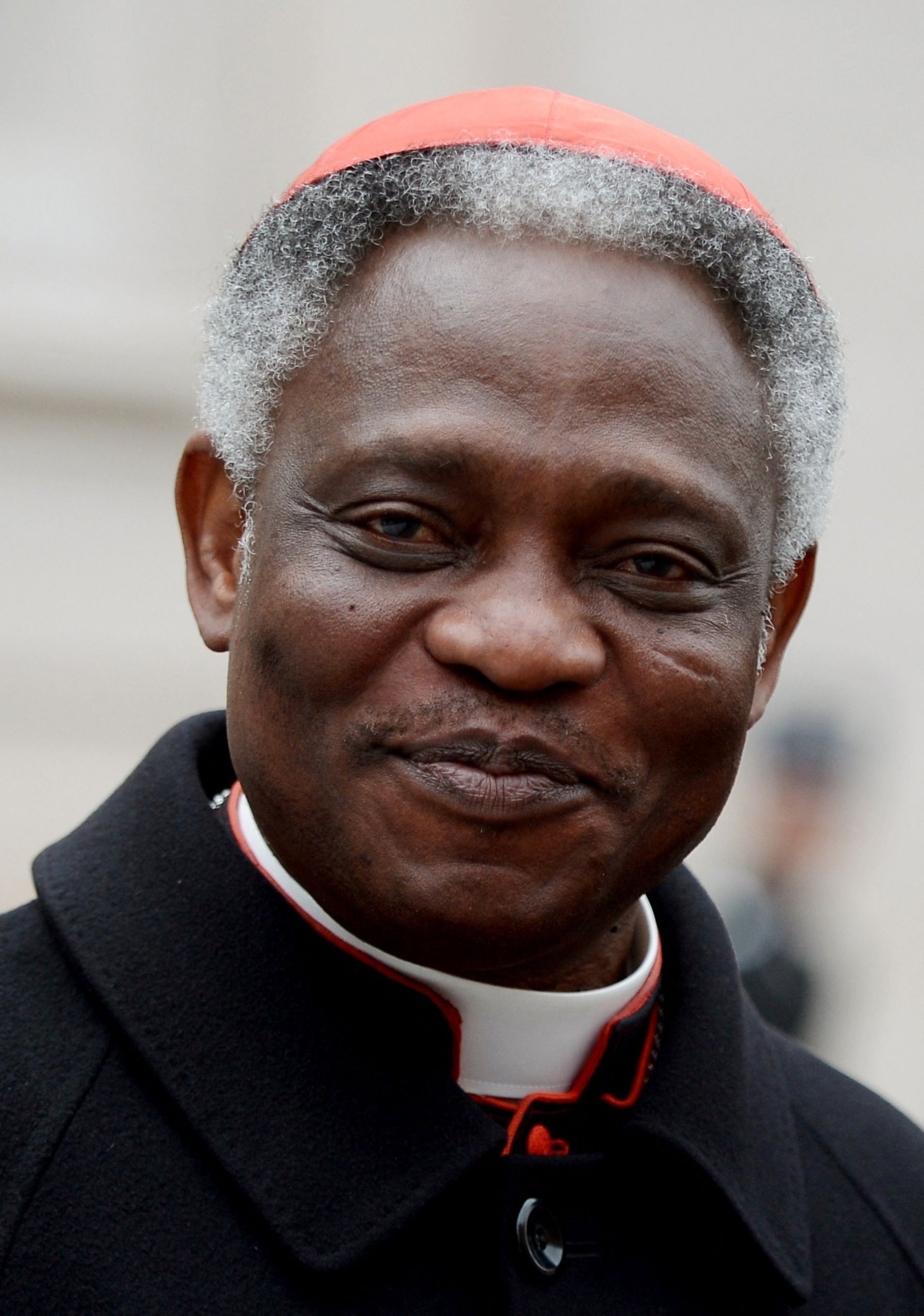 378921 Ghanaian cardinal Peter Kodwo Appiah Turkson arrives to take part in an afternoon meeting of pre-conclave at the Vatican, March 8, 2013. (AFP File Photo)