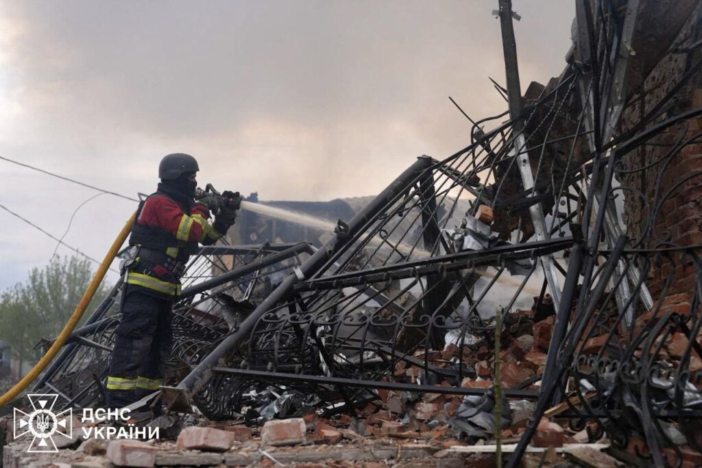 This handout photograph taken and released by the Ukrainian State Emergency Service shows a firefighter extinguishing the fire in a building following an air-attack amid the Russian invasion of Ukraine, in Sumy, northeastern Ukraine, May 6, 2025. (AFP Photo)