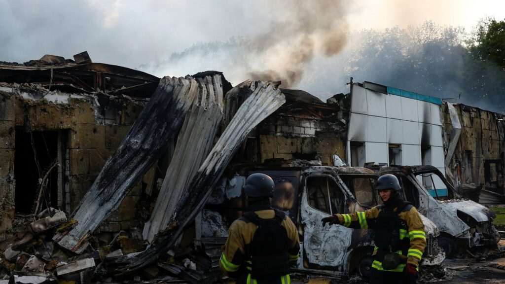 Firefighters work at the site of a Russian drone strike, outside of Kyiv, Ukraine, May 18, 2025. (Reuters Photo)