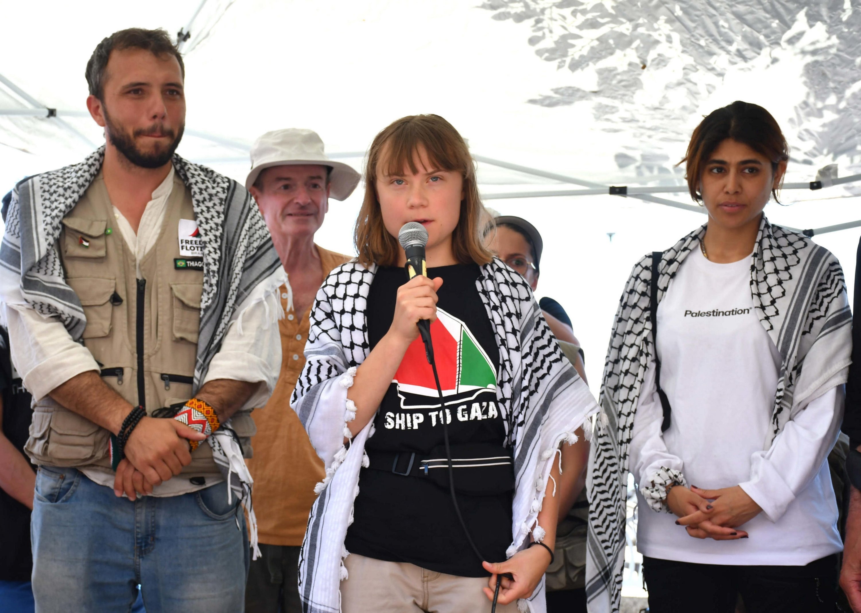385139 Swedish climate activist Greta Thunberg (C) speaks during a press conference together with the crew of the Madleen, the sailing ship of the NGO Freedom Flotilla, before departing from the port of San Giovanni Li Cuti headed to Gaza, Catania, Italy, June 1, 2025. (EPA Photo)