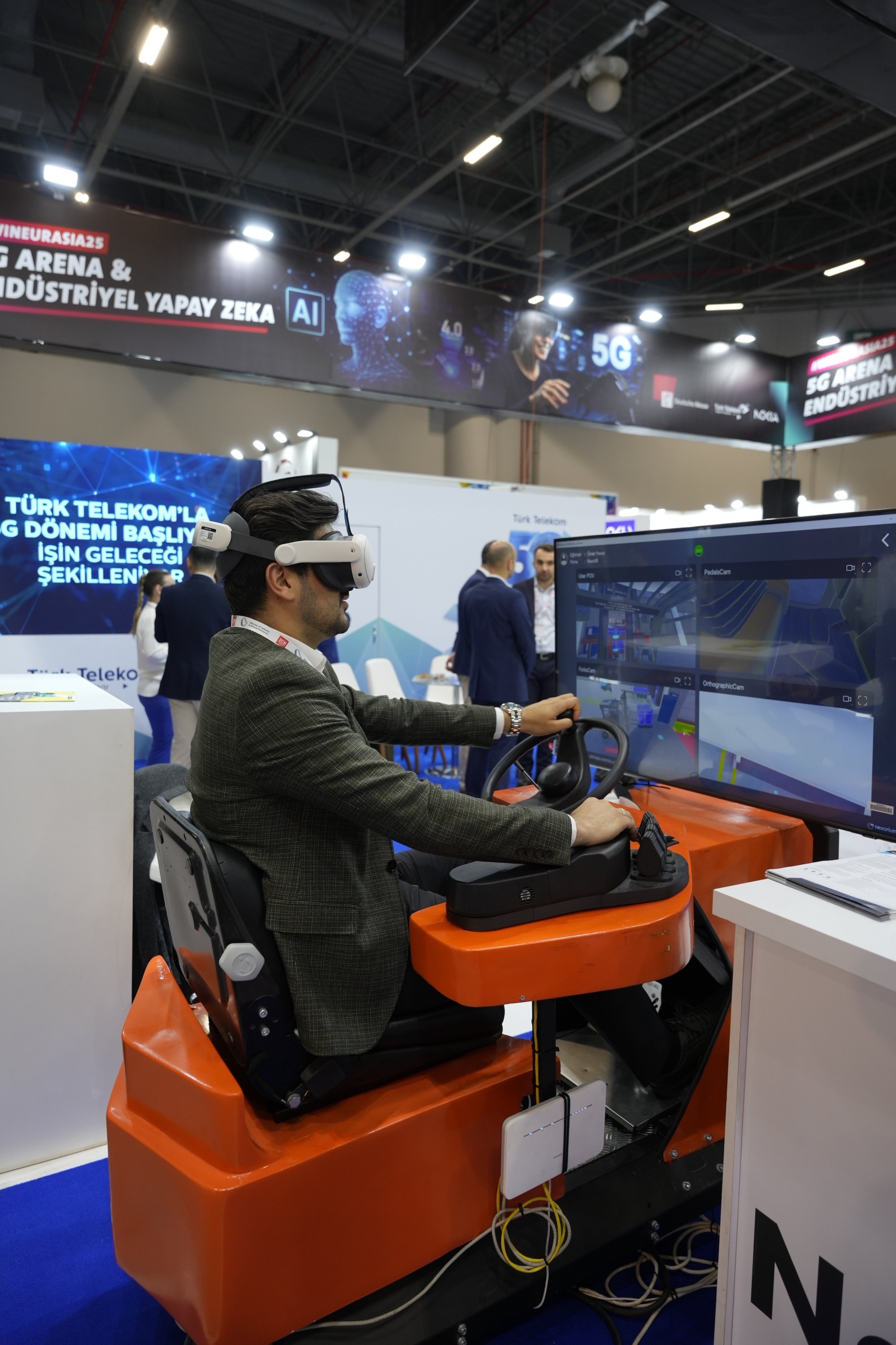 385762 A visitor tries a simulator at the WIN EURASIA 2025 trade fair in Istanbul, Türkiye. (Courtesy of Türk Telekom)