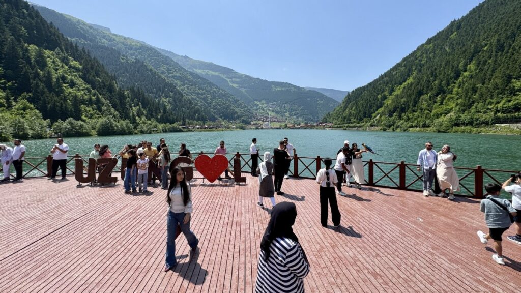 People are photographed in a popular area of Uzungöl, Trabzon, northern Türkiye, June 9, 2025. (AA Photo)