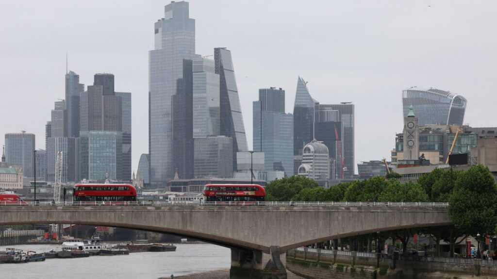 Buses cross Waterloo Bridge, backdropped by skyscrapers in the City of London financial district, London, U.K., May 15, 2025. (Reuters Photo)