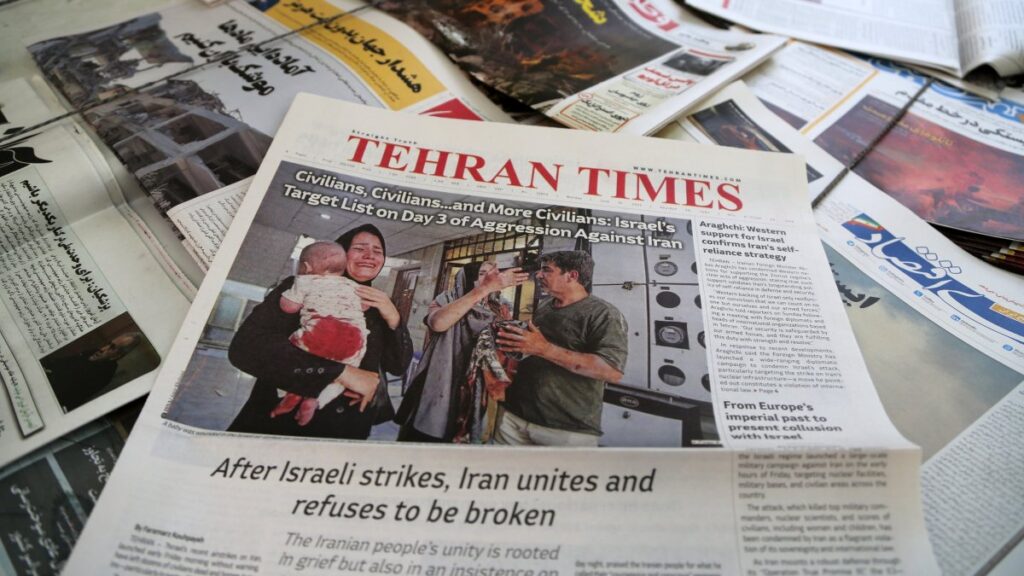 The front page of an Iranian newspaper is seen at a newsstand in Tehran, Iran, on June 16, 2025. (AA Photo)
