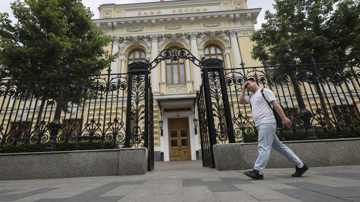 A man walks past the Central Bank of the Russian Federation headquarters, Moscow, Russia, June 6, 2025. (EPA Photo)