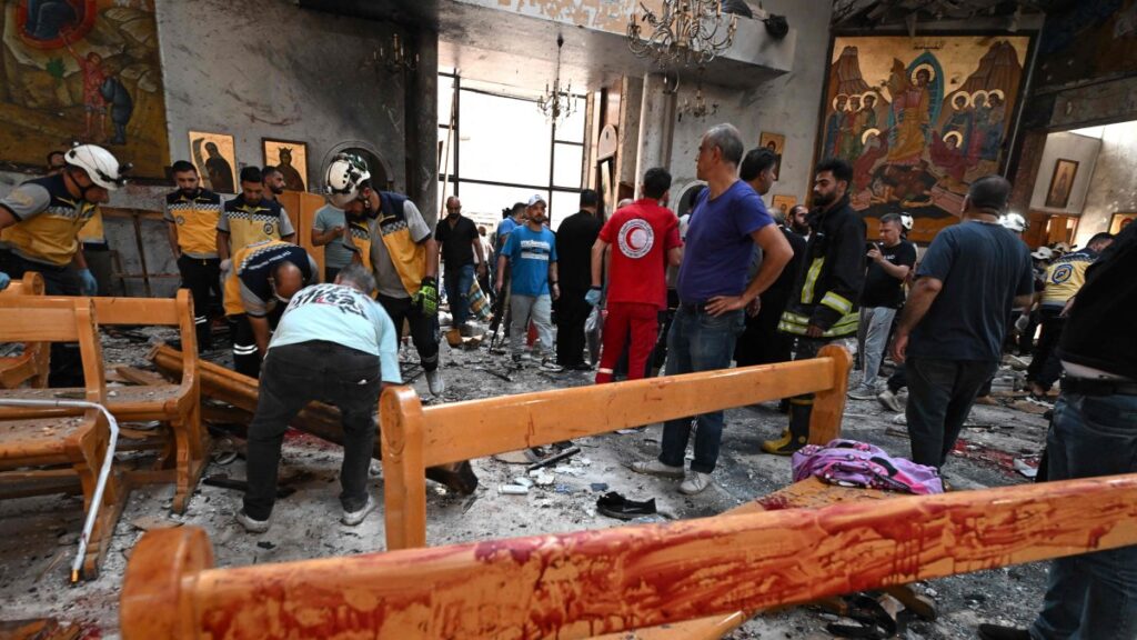 People and rescuers inspect the damage at the site of a reported suicide attack at the Saint Elias church in the Dwelaa area, Damascus, Syria, June 22, 2025. (AFP Photo)