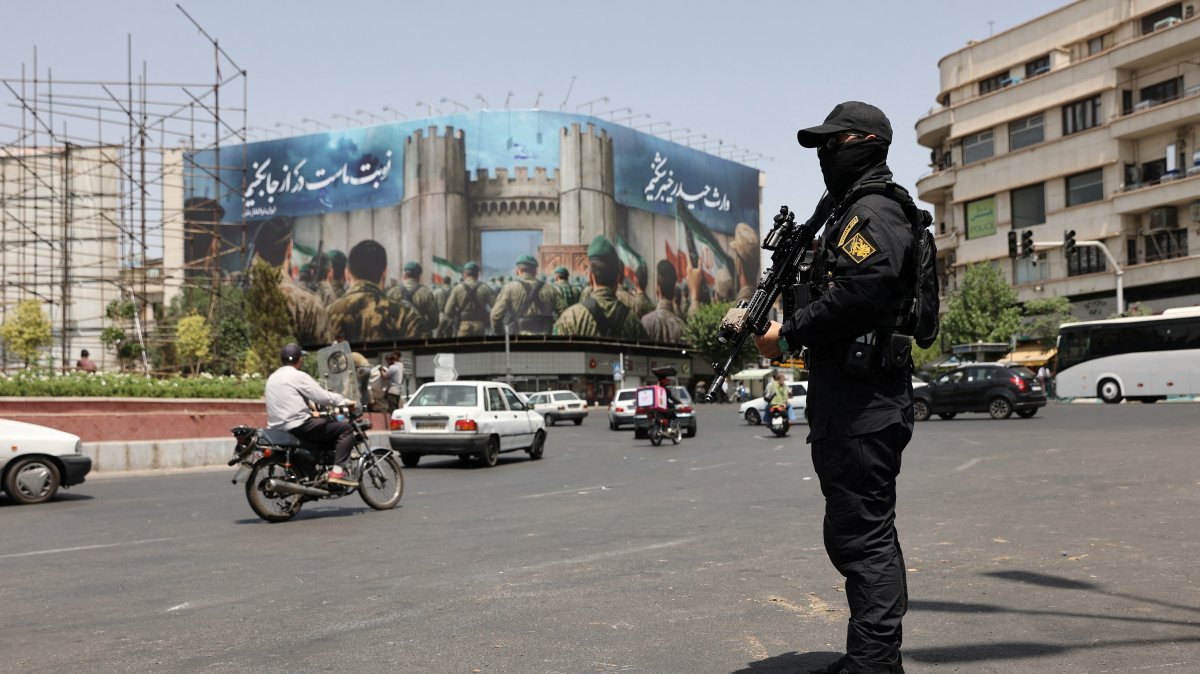 A security guard stands on a street, during early hours of cease-fire, Tehran, Iran, June 24, 2025. (Reuters Photo)