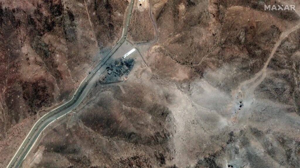 Airstrike craters are seen at the perimeter installation on Iran's Fordo Fuel Enrichment Plant (FFEP), Qom, Iran, June 24, 2025. (AFP Photo)