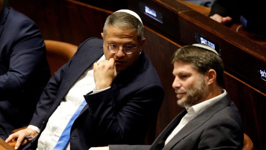 Right-wing Knesset members Itamar Ben-Gvir and Bezalel Smotrich attend a special session at the Knesset, Israel's parliament, to approve and swear in a new right-wing government, in Jerusalem Dec. 29, 2022. (Reuters File Photo)