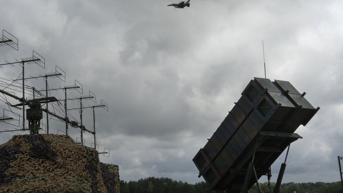 The Ukrainian Air Force's F-16 fighter jets fly over a Patriot Air and Missile Defense System in an undisclosed location in Ukraine, Aug. 4, 2024. (AP Photo)