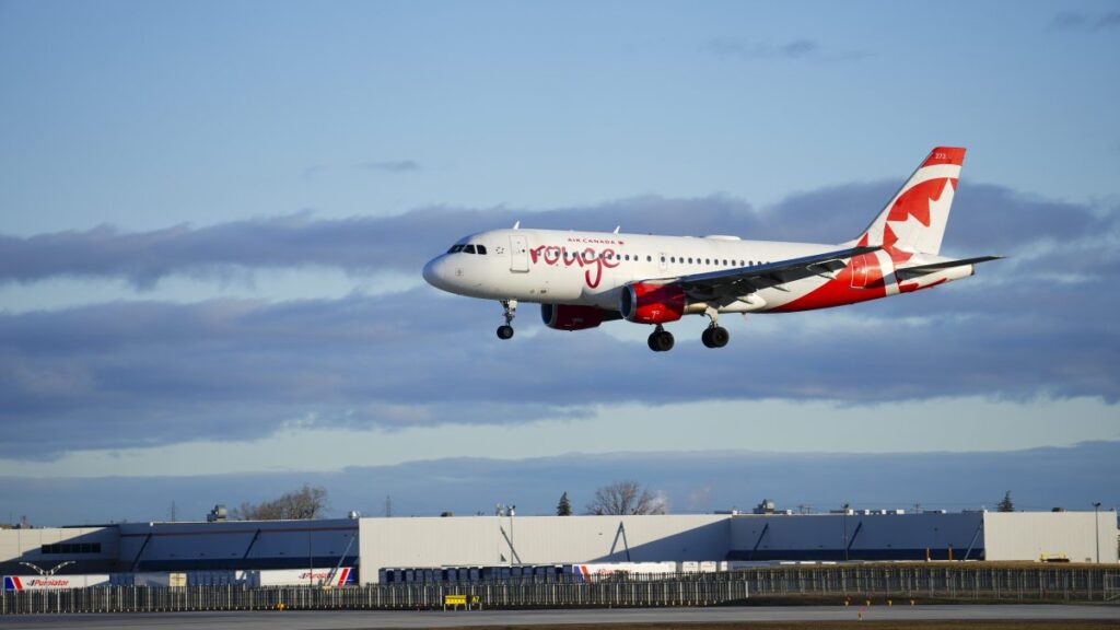 An Air Canada Rouge plane lands at Montreal-Pierre Elliott Trudeau International Airport in Montreal, Que., Wednesday, April 23, 2025. (Credit Image: © Sean Kilpatrick/The Canadian Press via ZUMA Press)