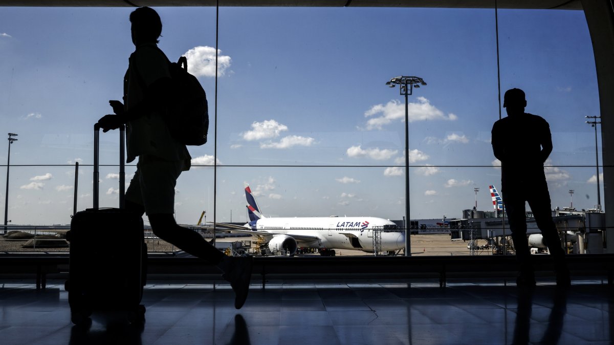 Passengers wait inside Roissy-Charles de Gaulle Airport during a French air traffic controllers' strike, in Roissy-en-France, outside Paris, France, July 3, 2025. (EPA Photo)