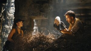 This image released by Universal Pictures and Amblin Entertainment shows Scarlett Johansson (L) and Jonathan Bailey in a scene from "Jurassic World: Rebirth." (AP Photo)